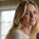 Client Emily R. smiling contentedly